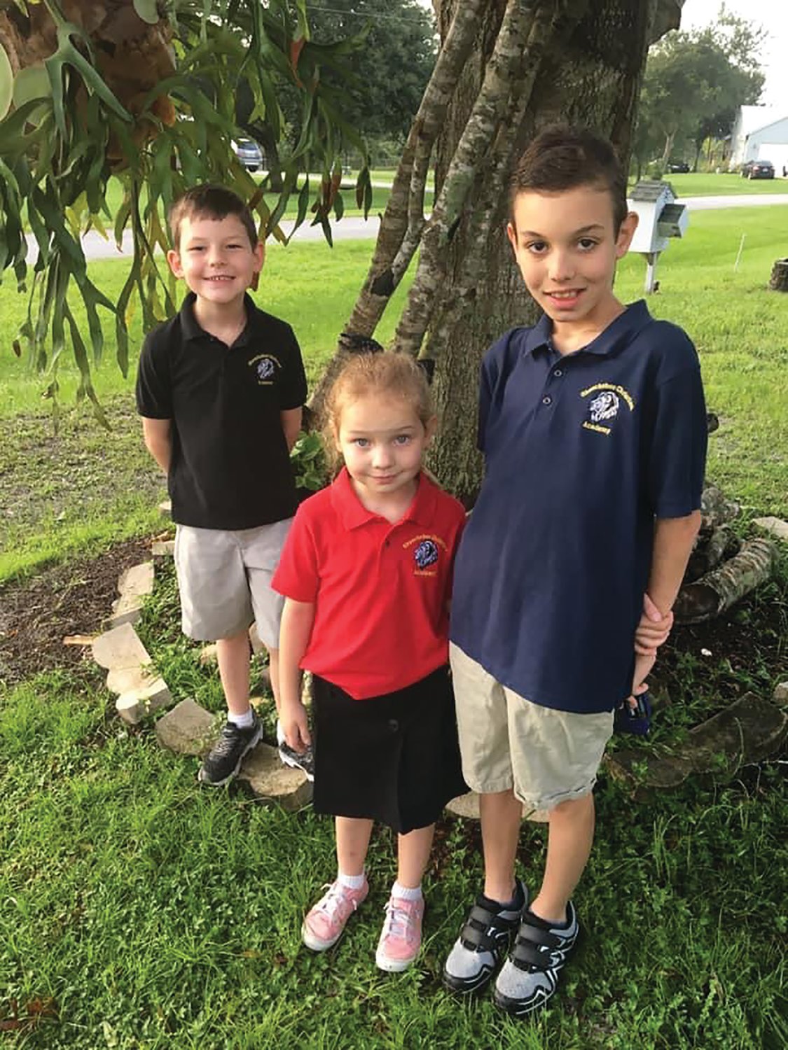 OKEECHOBEE – OCA students Justus, Aubrey and Nicholas Cole are ready for their first day of school.